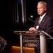 Amos speaks during commencement dinner