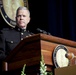 Amos speaks during commencement dinner