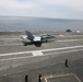 Flying high to qualify, pilots land aboard aircraft carrier