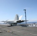 Flying high to qualify, pilots land aboard aircraft carrier