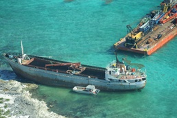 Response crews begin cutting up grounded vessel for removal