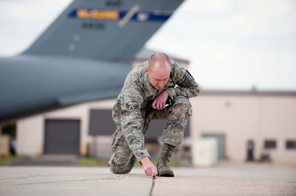Airman prepares flightline for 2012 Airshow