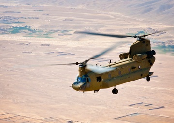 Task Force Corsair Chinook soar over Regional Command-East