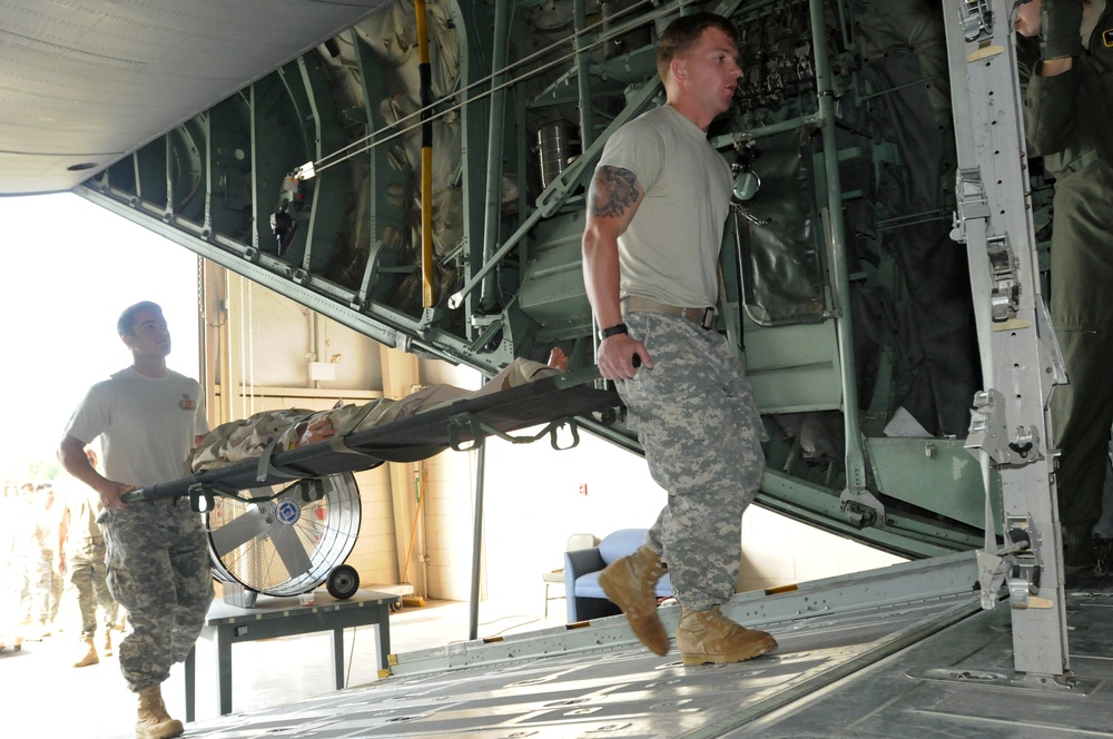 Hercules Training: The 2nd BCT conducts casualty evacuation exercise on C-130 aircraft