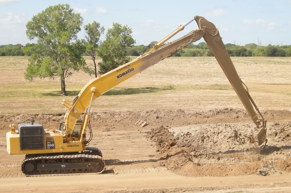 Digging a seepage cut-off wall in the Dallas Floodway