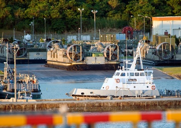 Landing Craft Air Cushions prepare to bring cargo from shore