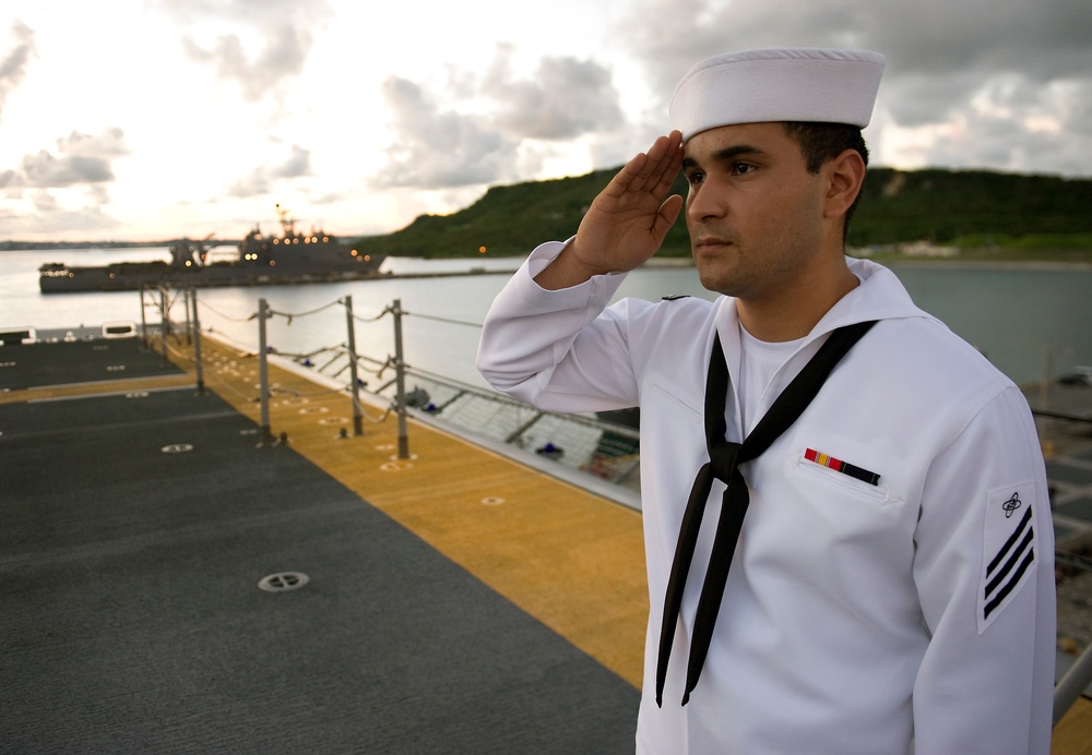 Holding a salute during evening colors