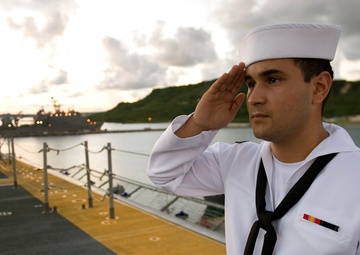 Holding a salute during evening colors