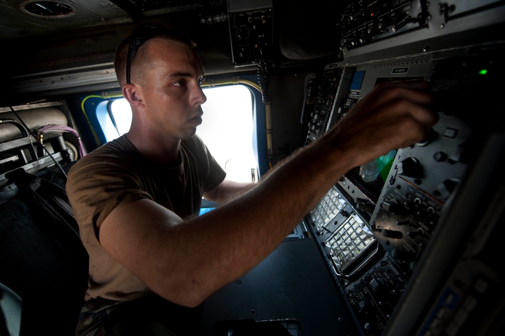 USS Jason Dunham sailor conducts pre-flight checks