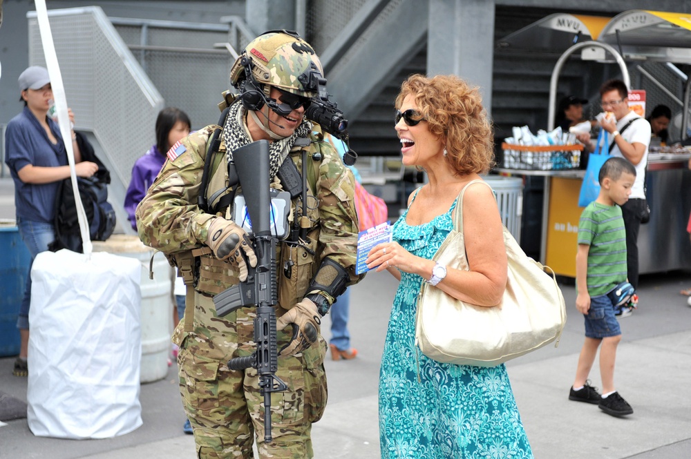 New Yorkers interact with members of the US Air Force during a series of demonstrations at the USS Intrepid on August 19, 2012 as Air Force Week kicks off