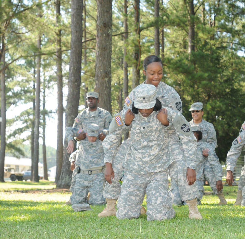 Soldiers carry a heavy load