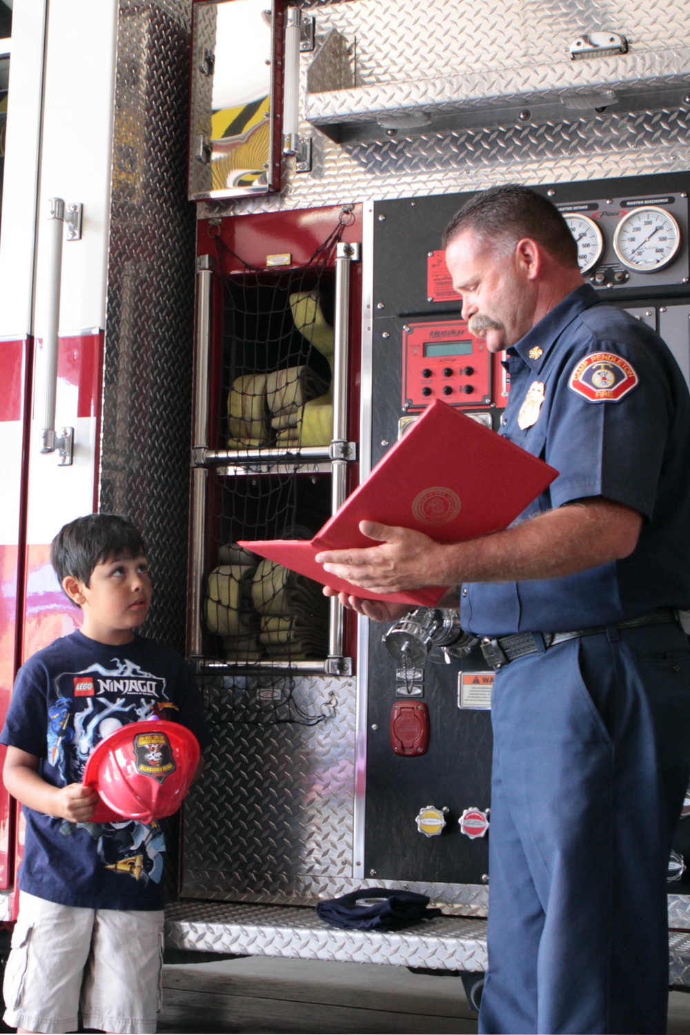 Child recognized as Camp Pendleton's honorary firefighter