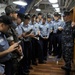 USS Blue Ridge sailors conduct ship tour, onload donuts