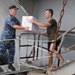 USS Blue Ridge sailors conduct ship tour, onload donuts