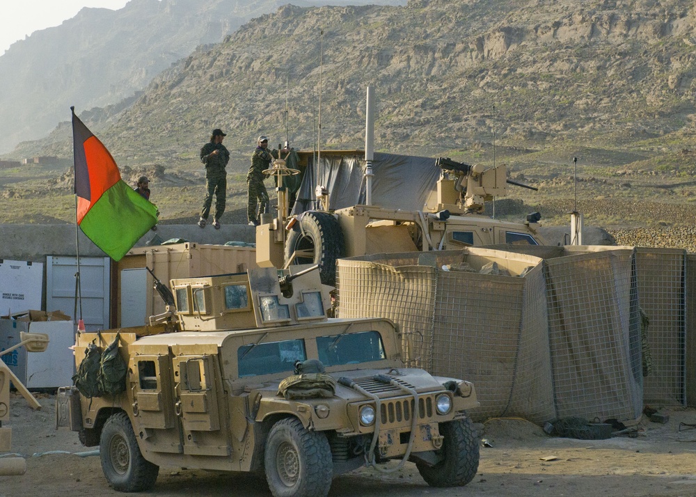 Afghan National Army Special Forces watch over the village of Sar Howza