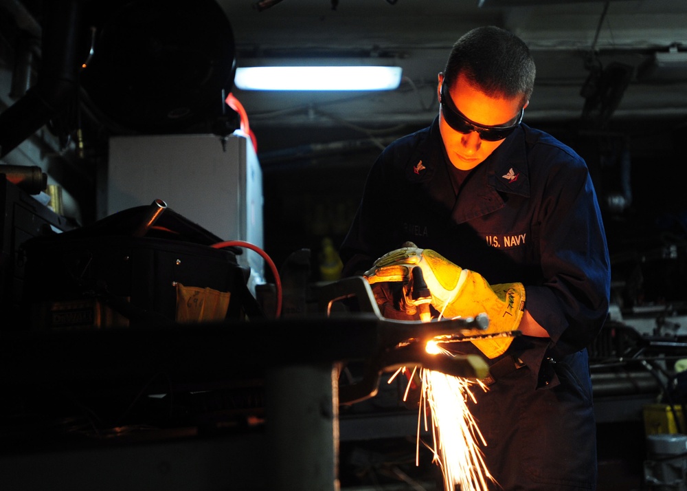 USS Enterprise sailors at work