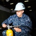 USS Ronald Reagan sailor preps for drill