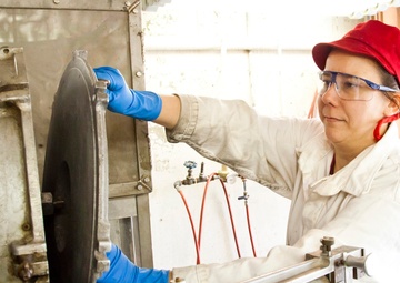 Engineer prepares to clean cutter wheel
