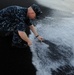 Sailor lays grandfather's ashes to rest on shores of Iwo Jima