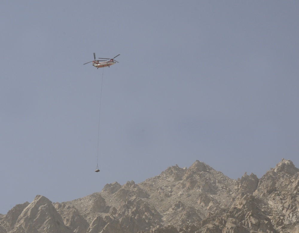 Helicopter delivers supplies near Salang tunnel