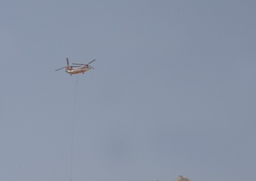 Helicopter delivers supplies near Salang tunnel