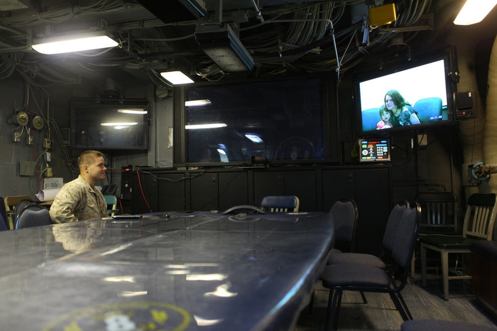 US Marines, sailors connect with families through video teleconference while deployed at sea