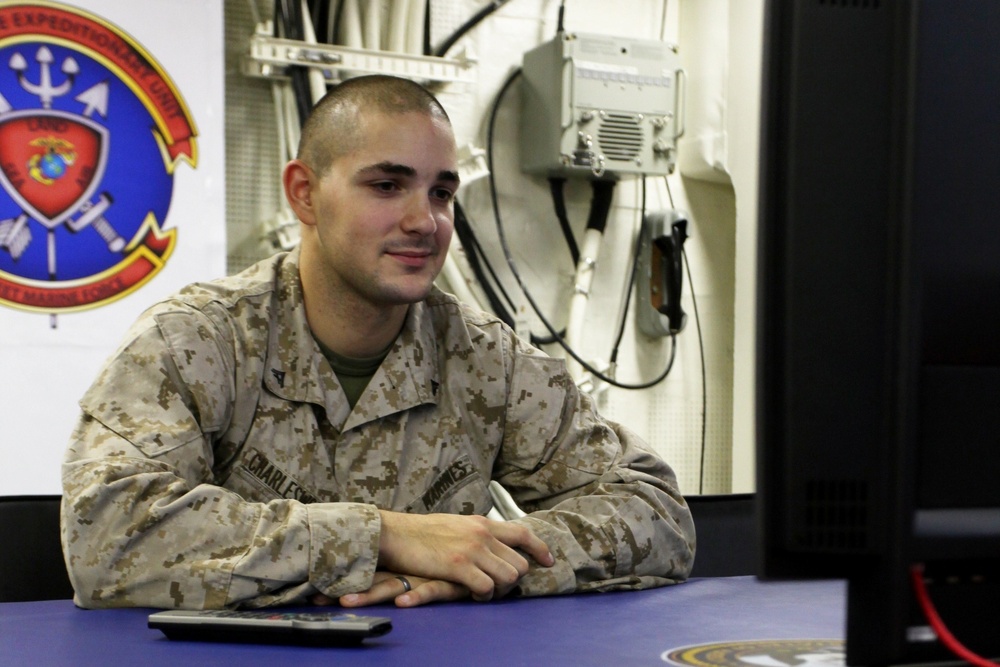 US Marines, sailors connect with families through video teleconference while deployed at sea