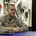 US Marines, sailors connect with families through video teleconference while deployed at sea