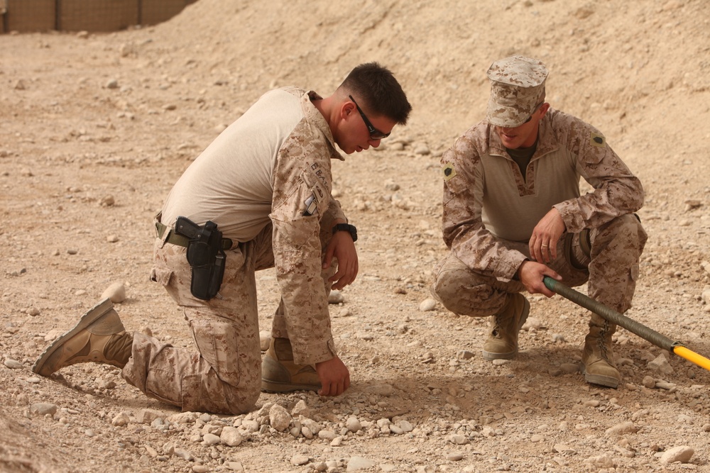 Explosive ordnance disposal technicians teach methods to counter improvised explosive devices in Afghanistan