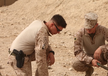 Explosive ordnance disposal technicians teach methods to counter improvised explosive devices in Afghanistan