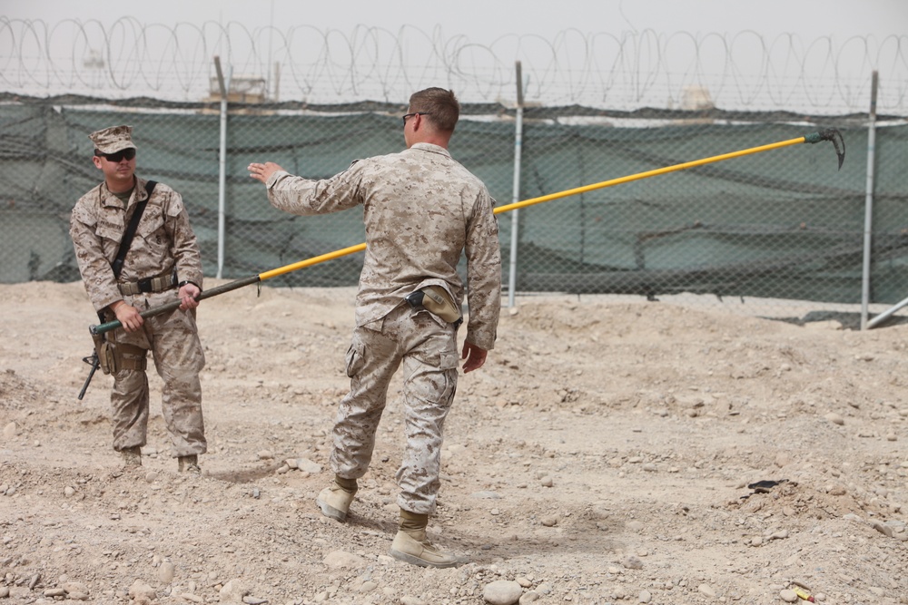 Explosive ordnance disposal technicians teach methods to counter improvised explosive devices in Afghanistan