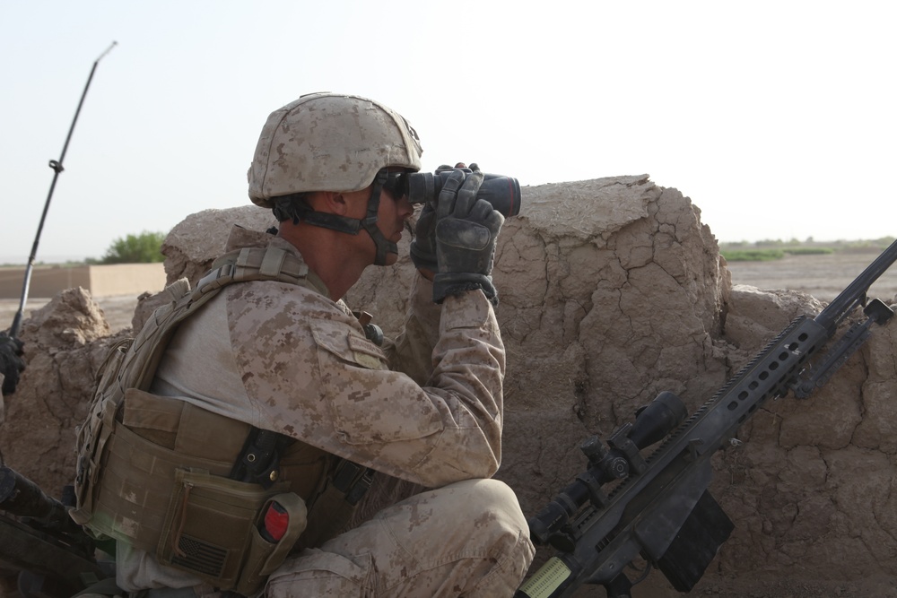 Scout snipers keep watch over Marines
