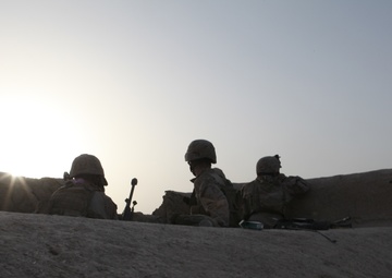 Scout snipers keep watch over Marines