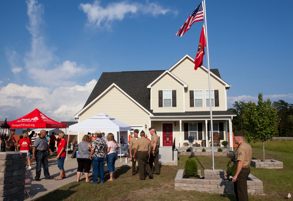 Home dedication and flagpole raising ceremony for Sgt.Maj. Mackey