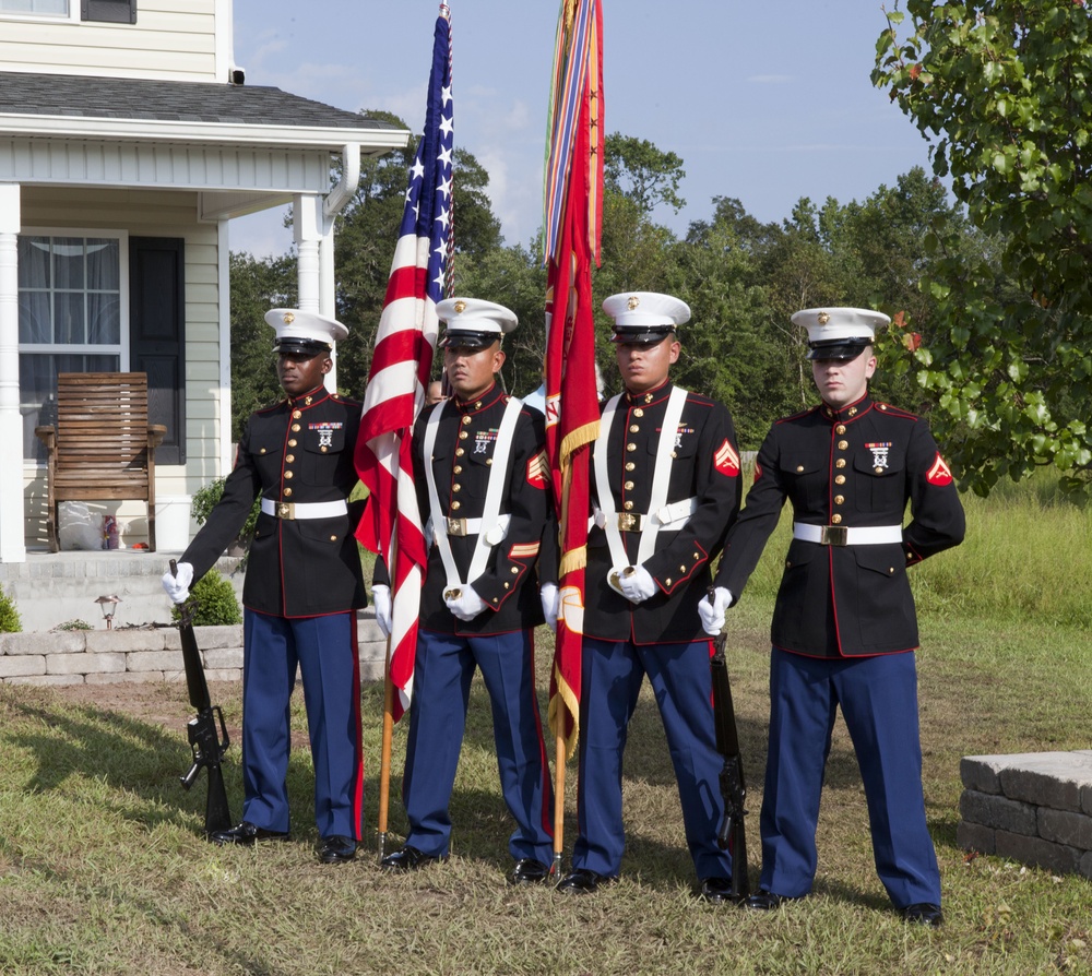 Home dedication and flagpole ceremony for Sgt.Maj. Mackey