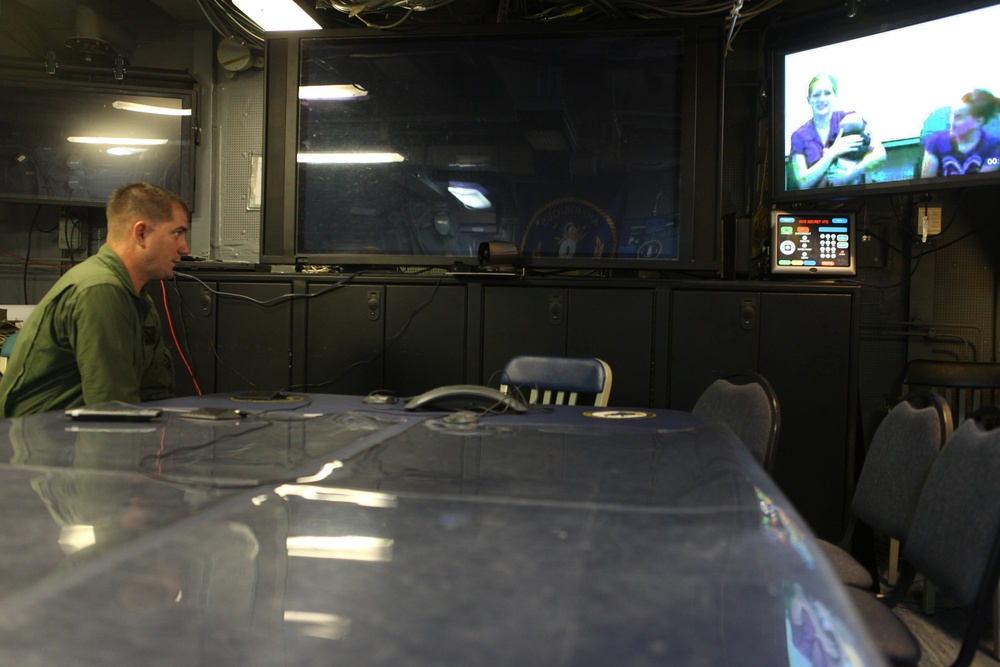 US Marines, sailors connect with families through video teleconference while deployed at sea