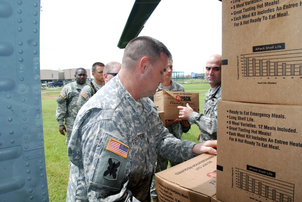 Louisiana National Guard unload supplies to Grand Isle