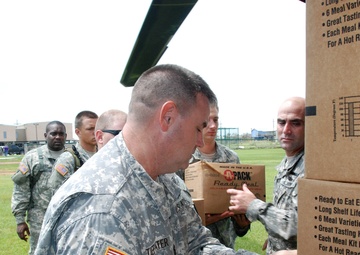 Louisiana National Guard unload supplies to Grand Isle