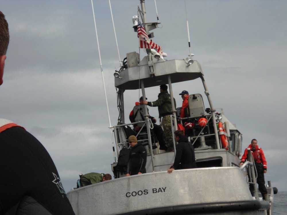 Navy Seabee divers on USCG MLB