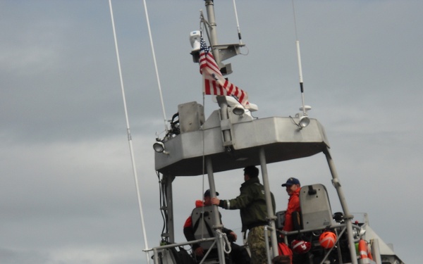 Navy Seabee divers on USCG MLB