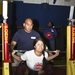 Powerlifters “pump up the volume” while pushing limits during competition