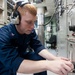 USS Hue City sailor at work