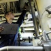 USS Tortuga sailor checks tank