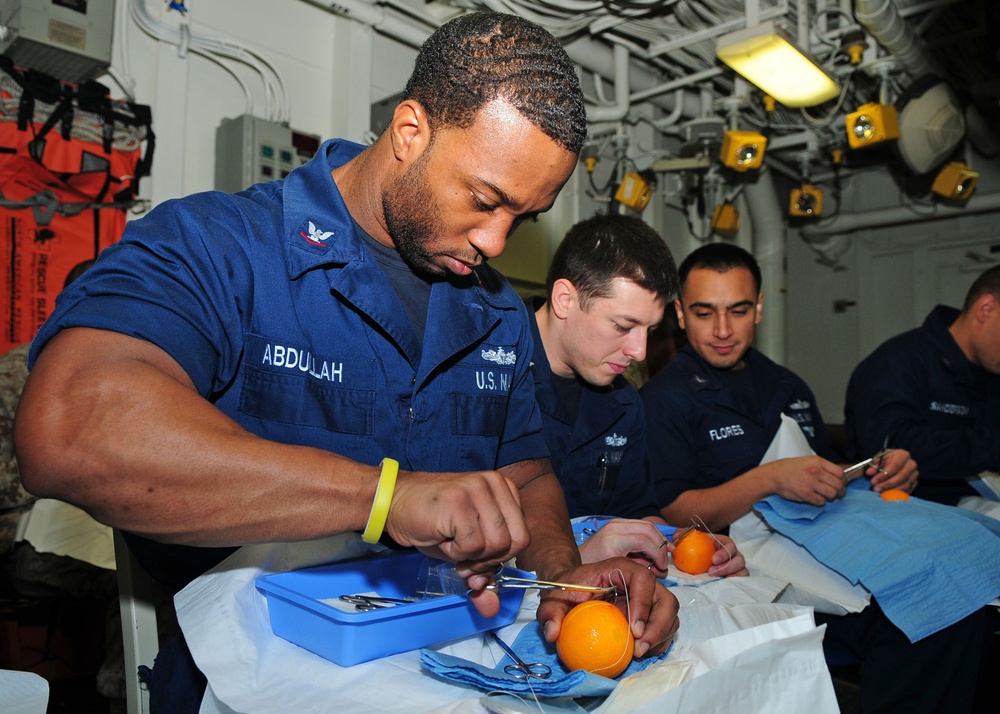 USS Iwo Jima sailors practice suturing