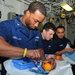 USS Iwo Jima sailors practice suturing