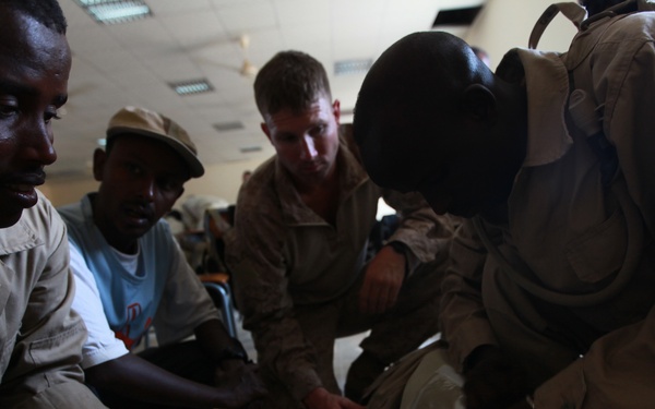 Marines and sailors from Special-Purpose Marine Air-Ground Task Force Africa train with elite Djiboutian forces