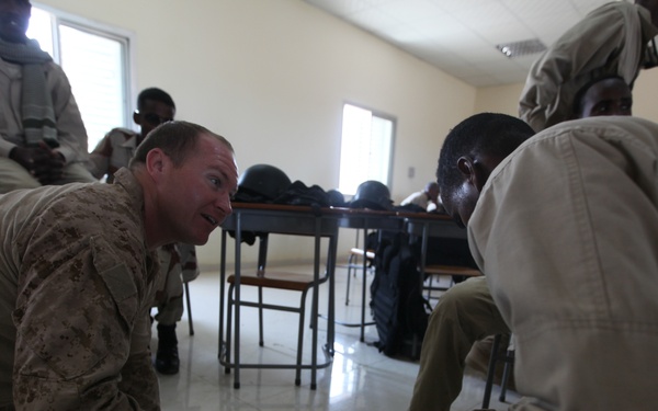 Marines and sailors from Special-Purpose Marine Air-Ground Task Force Africa train with elite Djiboutian forces