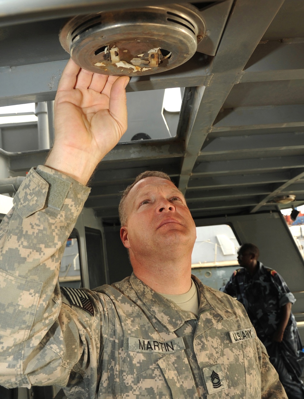 Partnering with US soldiers assists Djiboutian sailors in fixing patrol boats