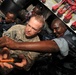 Partnering with US soldiers assists Djiboutian sailors in fixing patrol boats