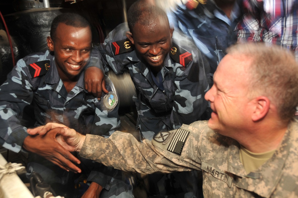 Partnering with US soldiers assists Djiboutian sailors in fixing patrol boats